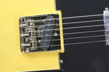 Gamyklos užsakymą geltonos spalvos elektrinė gitara su juoda kepta, chromuotas aparatūros, gali būti pritaikytas.